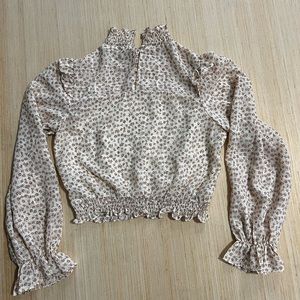 Papaya cream colored turtle neck long sleeve blouse